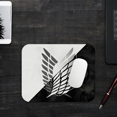 This mouse pad features the iconic Survey Corps emblem from Attack on Titan, split into a sleek black-and-white design. The bold, minimalist style adds a professional yet fandom-inspired look to your desk, while the smooth surface ensures optimal mouse control and the non-slip base provides stability.